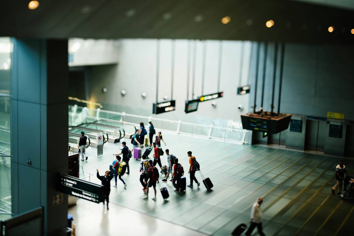 Coverage Limits Explained infographic showing baggage loss insurance payout tiers and common exclusions